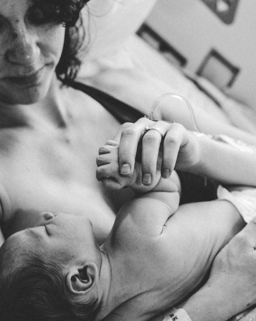 baby skin to skin with Mum, sleeping