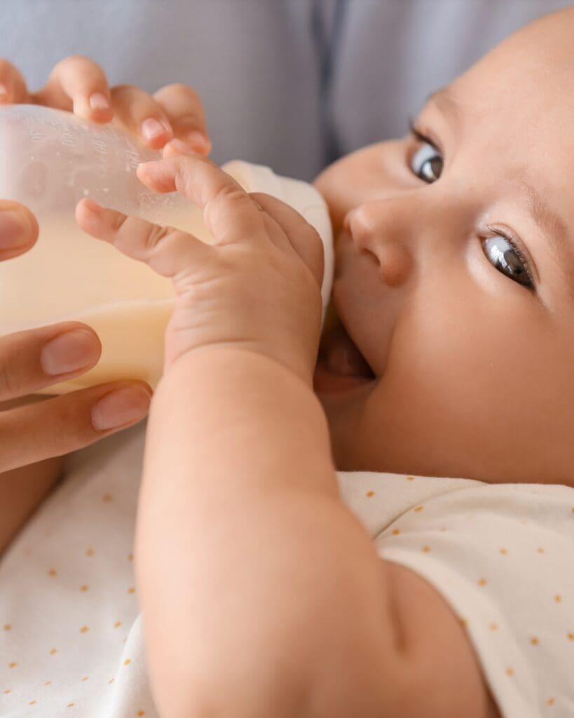 breastfed baby being bottle fed